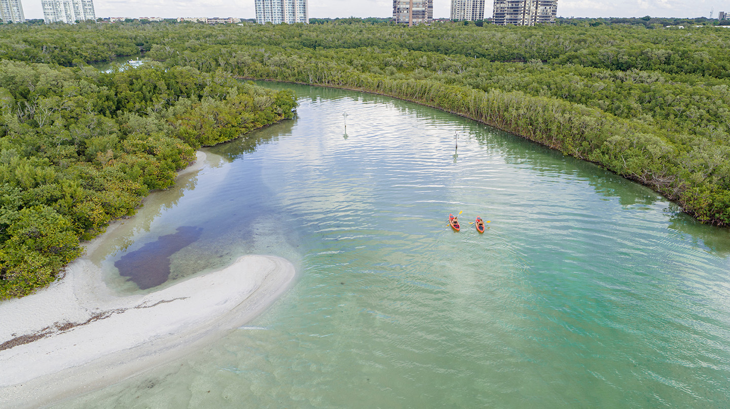 Couple Kayaking in Clam Pass Park