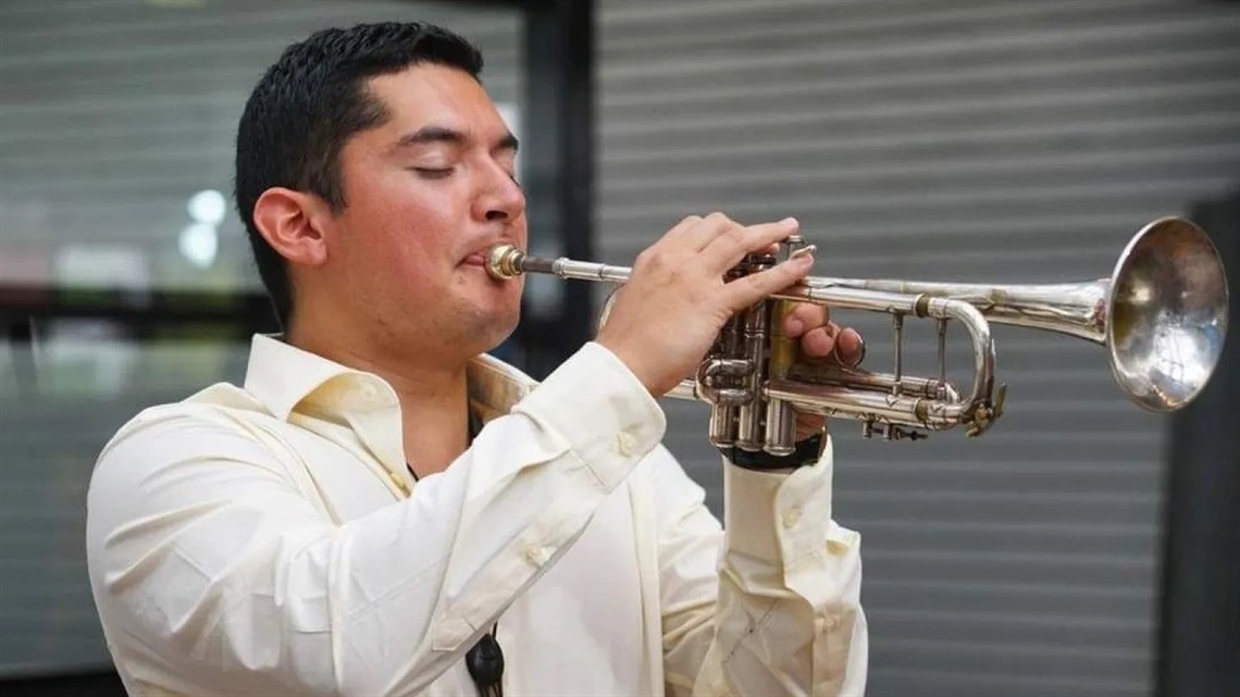 Fernando Ferrarone playing the trumpet
