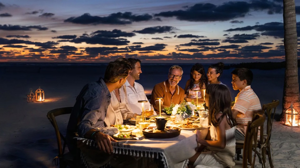 Multi Generational Family Dining on the Beach