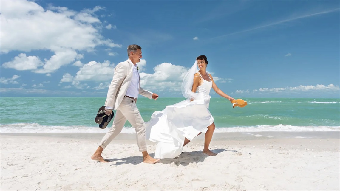 Wedding Couple Walking on the Beach