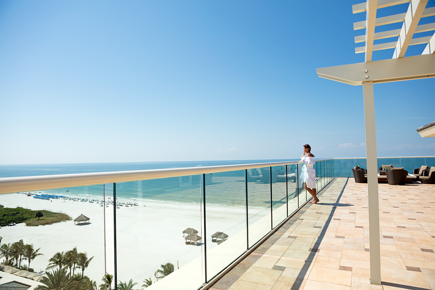 Spa Balcony Woman Beach View.jpg