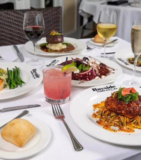 Table set with variety of food and drinks