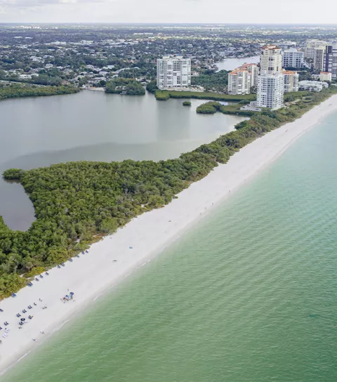 Aerial view of Naples coastline and Clam Pass Park