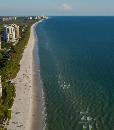 Vanderbilt Beach aerial at sunset.