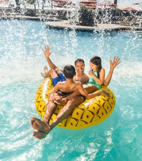 Family at a beach resort in Florida's Paradise Coast