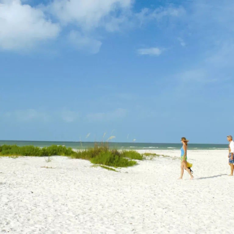 Explore the wide stretches of nearly deserted white sand beach on Keewaydin Island. Photo