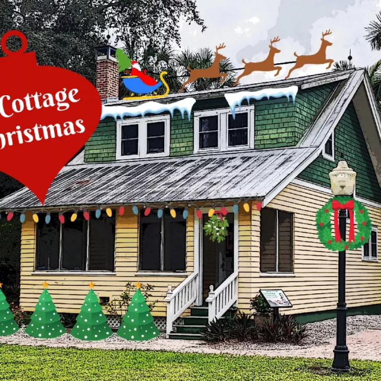 Yellow cottage with clip art Christmas decorations Photo