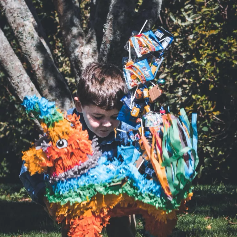 Boy with piñata Photo