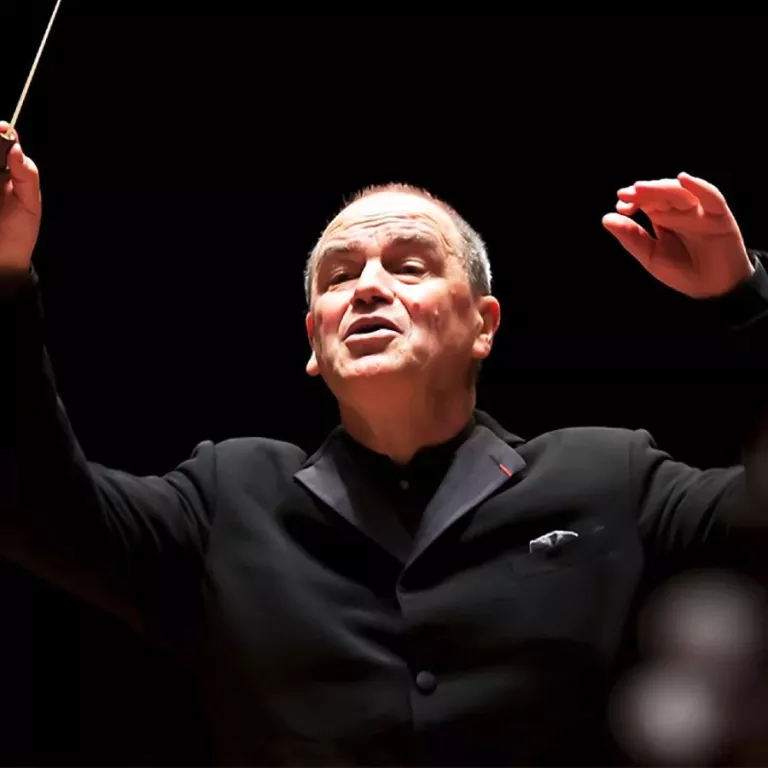 Hans Graf, conductor. Photo Courtesy of ArtisꟷNaples Photo