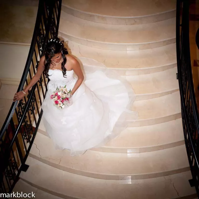 Bride on stairs at Inn on 5th, Naples FL Photo 5