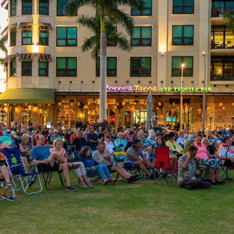 Guests enjoying live music on Mercato's event lawn Photo