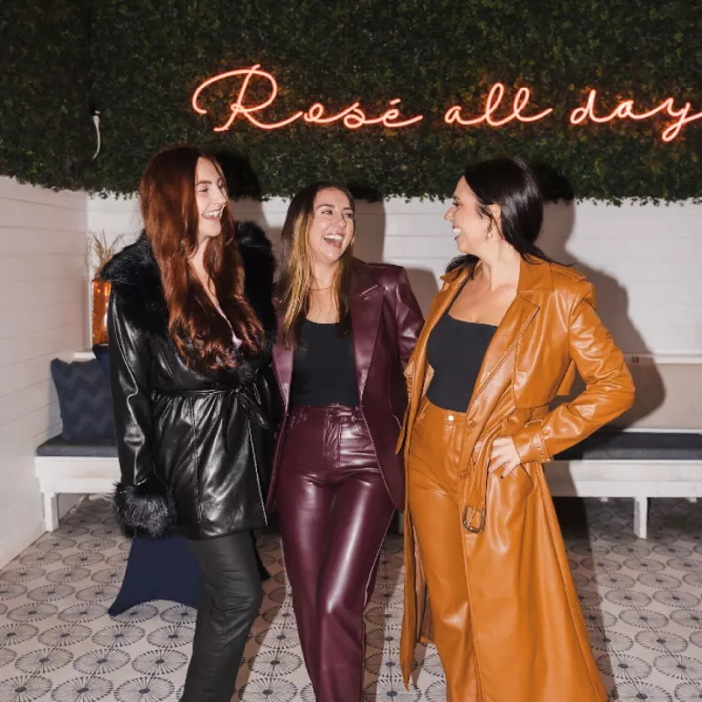 Group of women posed for camera at a Galentine's Day function at Hampton Social Photo