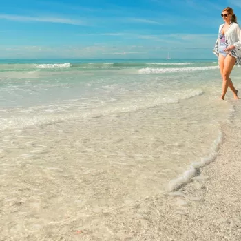 Woman walking on the beach