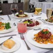 Table set with variety of food and drinks