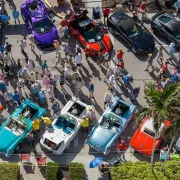 aerial of crowd viewing vintage cars on fifth street