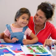 Image of a family enjoying arts and crafts at Community Day Photo
