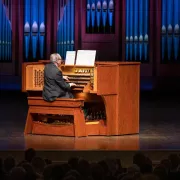 Image of a performer playing the organ at Artis—Naples Photo
