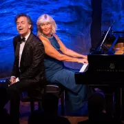 Image of Mark Sanderson and Jodie de Salvo on stage during performance Photo