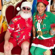 Coastal Santa Claus making an appearance during Christmas in July Artisan Market Photo