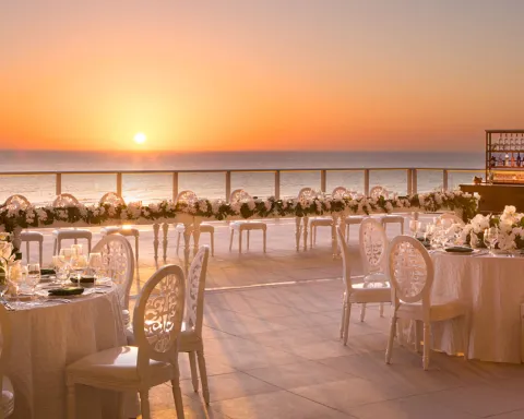 terrace overlooking the water set-up for wedding