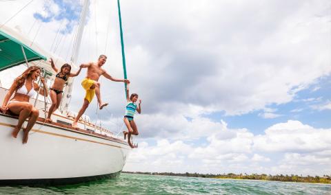 things-to-do-hero-family-jumping-off-sailboat.jpg