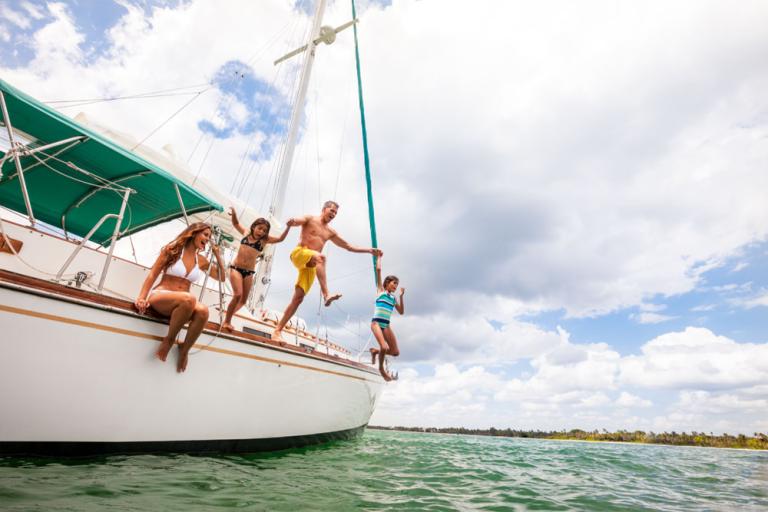 Family on a sailboat in Florida's Paradise Coast