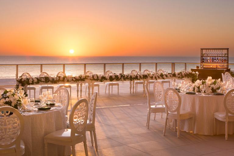 terrace overlooking the water set-up for wedding