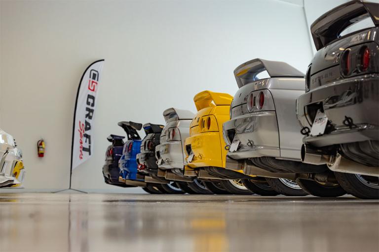 a lineup of GT-R taillights in the CRAFT SPORTS showroom