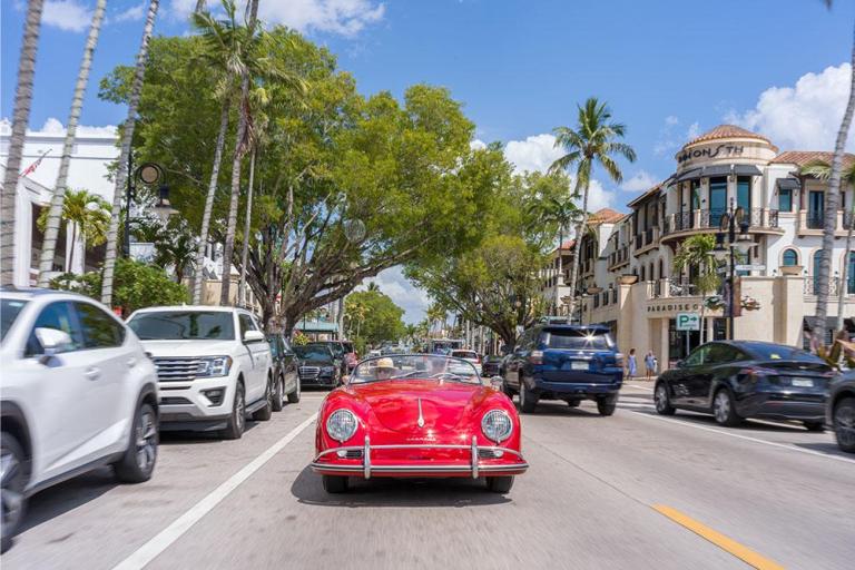 vintage porsche driving down 5th avenue south